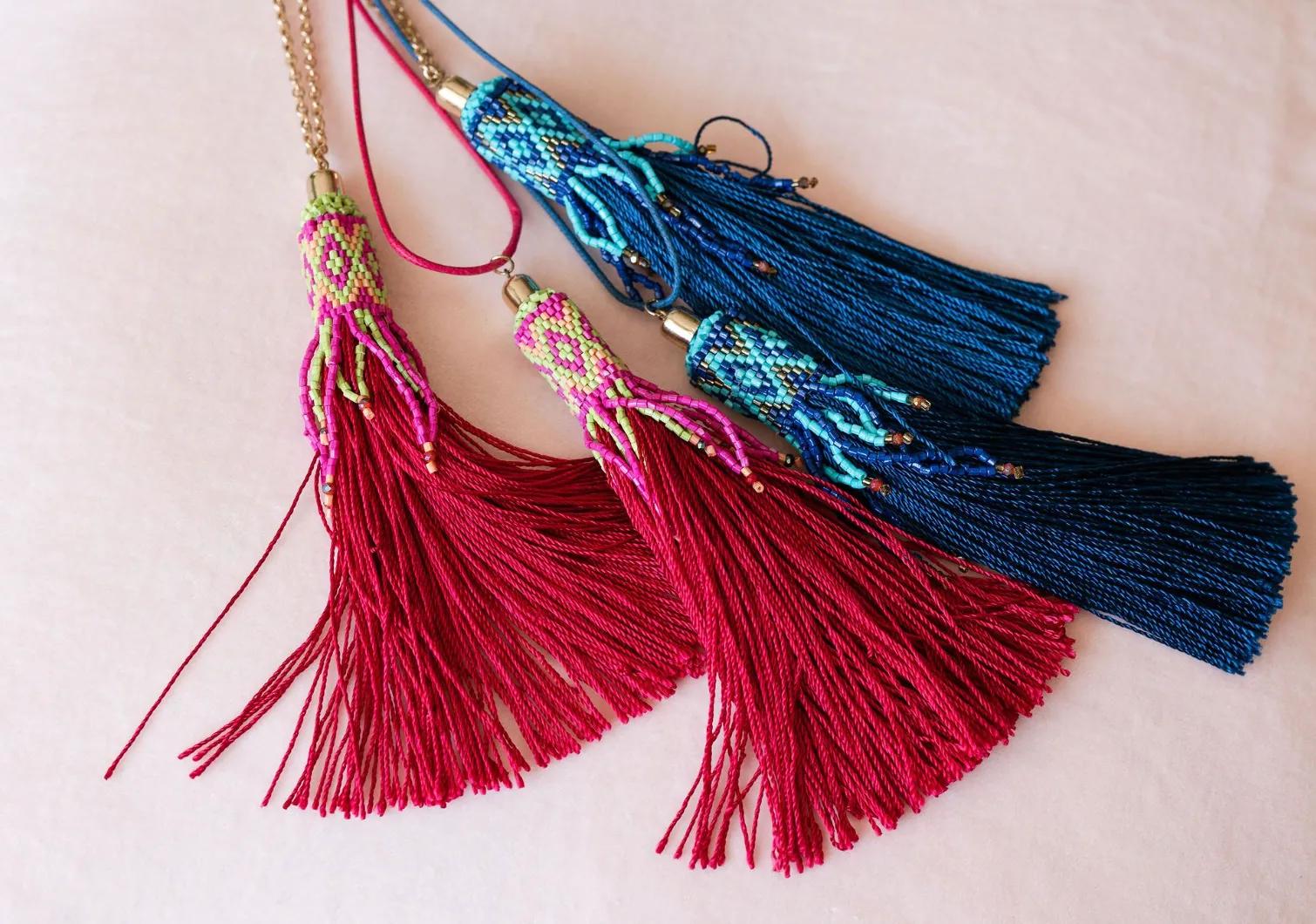 Pink tassel necklace on cord